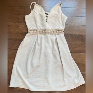 love j taupe dress with crochet cutout on the midriff in size medium